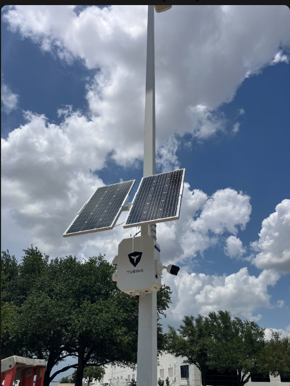 Turing SkyShield solar surveillance installation on a light pole